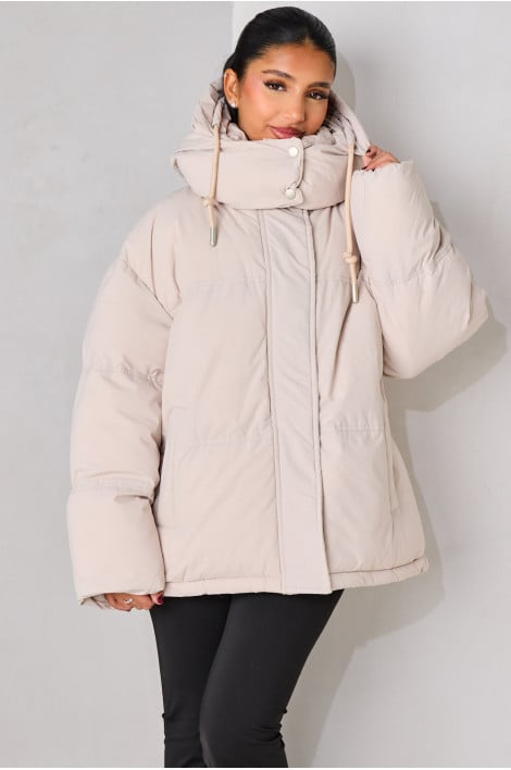 Doudoune beige à capuche matelassée
