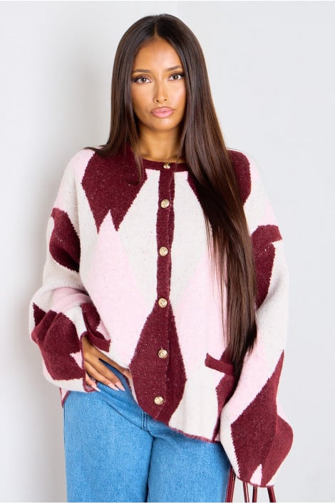 Gilet en laine rose à motifs géométriques et boutons dorés