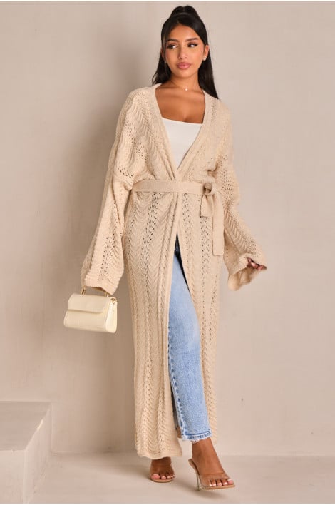 Gilet long en maille ajourée et ceinturé beige