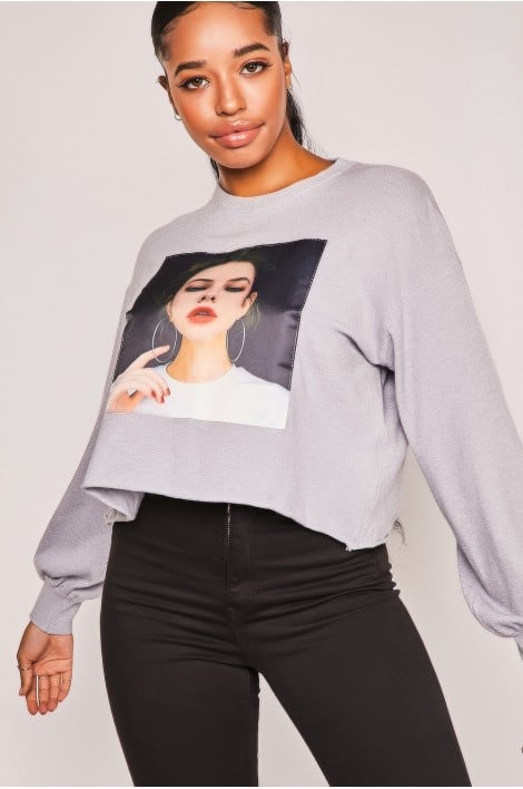 Pull gris tête de femme