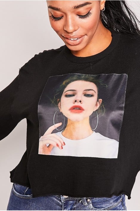 Pull noir tête de femme