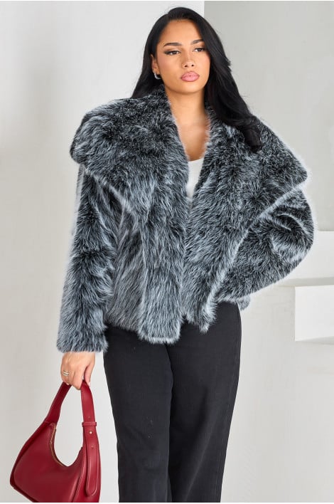 Veste en fourrure noire et blanche